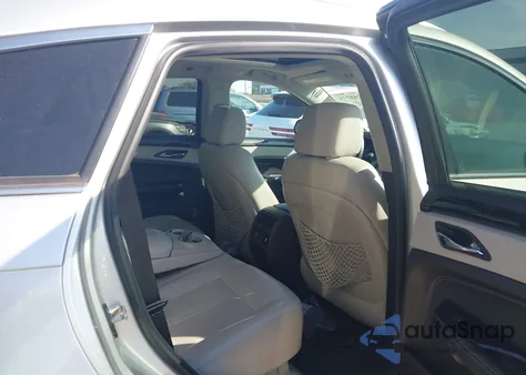 2015 Cadillac Srx Luxury Collection z USA, uszkodzony, nr VIN 3GYFNBE36FS576665